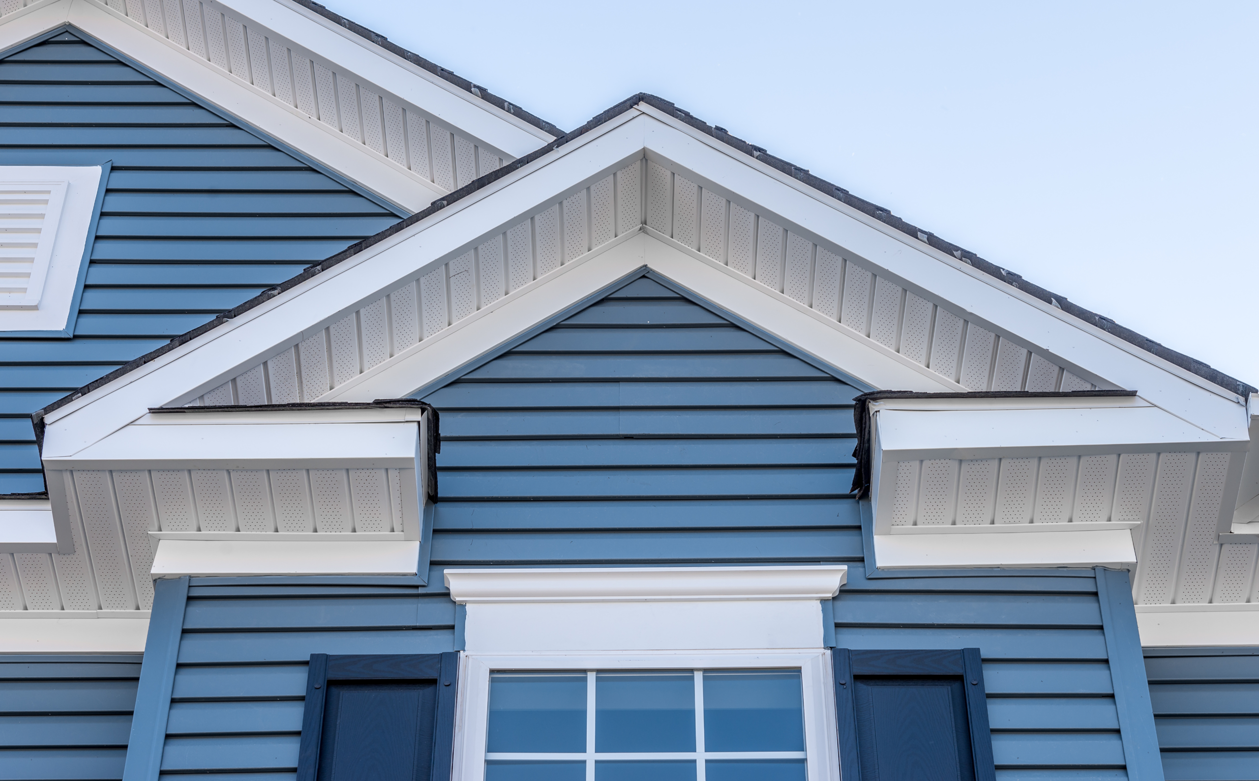 Blue house with white trim details